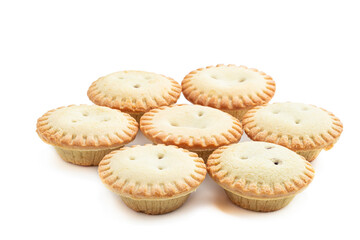 Mini berry confiture pies isolated on white