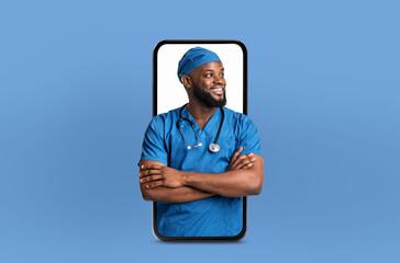 African American doctor is seen on a phone screen, engaging in a video call or providing...