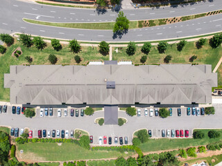Drone Images of An Asphalt Shingle Roof on an Apartment Building on a Bright Sunny Day