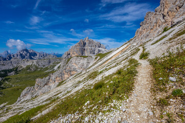 Dolomites beautiful mountain landscape on a sunny day. Hiking in the Alps in Italy, South Tirol mountain range of Alpi Dolomiti di Sesto near Cortina di Amprezzo and Tre Cime di Lavaredo alpine scene