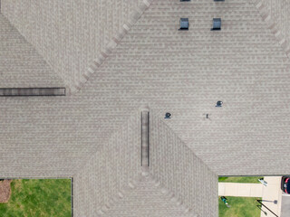 Drone Images of An Asphalt Shingle Roof on an Apartment Building on a Bright Sunny Day