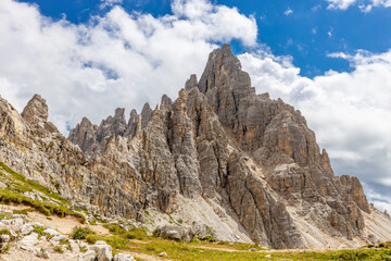 Dolomites beautiful mountain landscape on a sunny day. Hiking in the Alps in Italy, South Tirol mountain range of Alpi Dolomiti di Sesto near Cortina di Amprezzo and Tre Cime di Lavaredo alpine scene