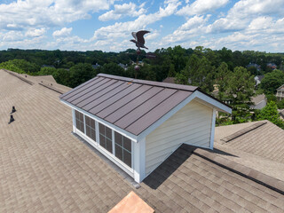 Drone Images of An Asphalt Shingle Roof on an Apartment Building on a Bright Sunny Day
