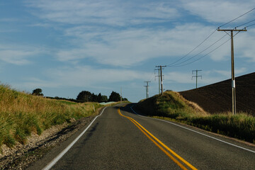 Open Road with Power Lines New Zealand No People afternoon outside