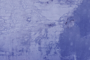 Shabby, weathered, blue plaster with small cracks. Texture of a blue concrete wall.