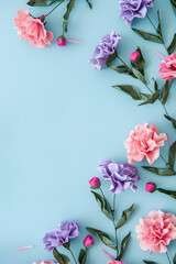 Colorful flowers  frame on the blue background.