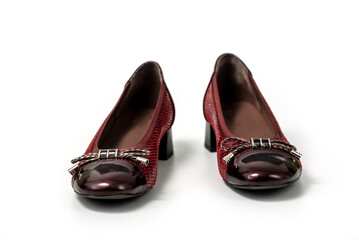 Studio photo of brown female loafers with low heel. Slip on female leather brown shoes on white background. Clipping path included