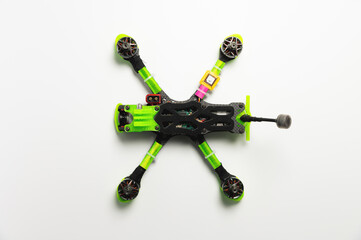 DIY quadcopter on a white background. Modern radio controlled FPV drone