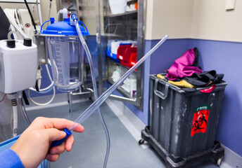 hospital suction tube with yankauer suction tip, isolated on white background