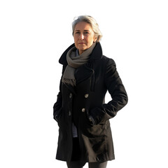 Poised elderly lady in a stylish coat and scarf poses on a checkered backdrop