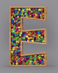 3d rendering of the English alphabet. Wooden letters with colorful candies