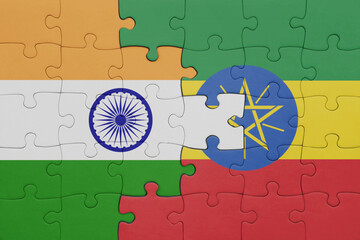 puzzle with the colourful national flag of ethiopia and flag of india.