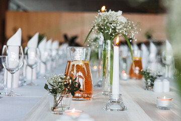 hotel restaurant, close-up photo, blurred background, catering, hotel, hotel food and kitchen, table with plates, wine and juice glasses, fruit drinks in a jug