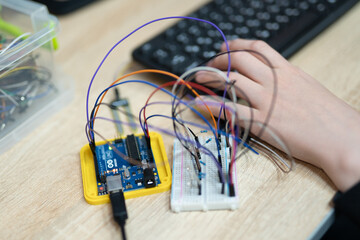 an engineer is engaged in the development and layout of electrical circuits