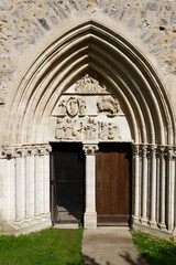 Tympanum of the Collegiate Church of Our Lady of the Assumption in the rural town of Crecy la...