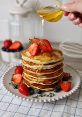 pancakes with strawberry and honey