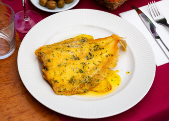 Lenguado meuniere in lemon sauce closeup. French cuisine