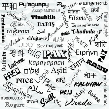 the word peace in all the languages of the world and with each word in a different font, the background is a slightly wrinkled sheet of white paper