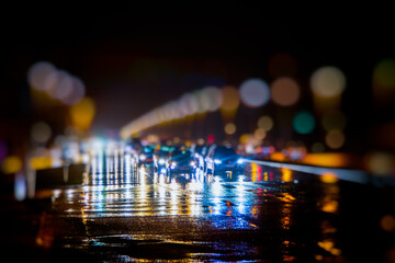 Rainy night city lights bokeh