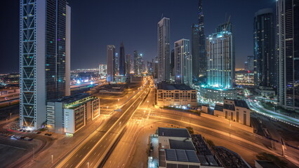City nightscape with illuminated skyscrapers and traffic
