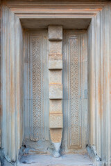 Obraz premium Exterior architecture of historic Angkor Wat temple details.