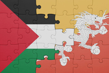 puzzle with the colourful national flag of bhutan and flag of palestine.