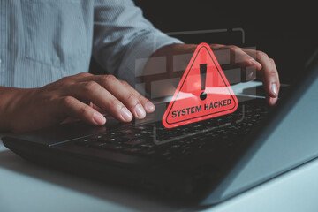System hacked alert after cyber attack on laptop computer network. compromised information concept....