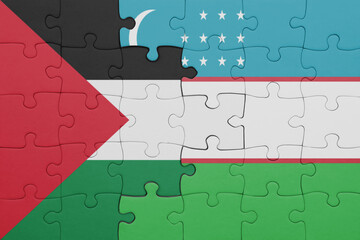 puzzle with the colourful national flag of uzbekistan and flag of palestine.