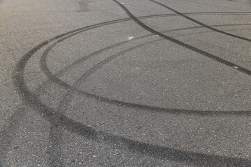 tire tracks during dangerous driving on the road © rsooll