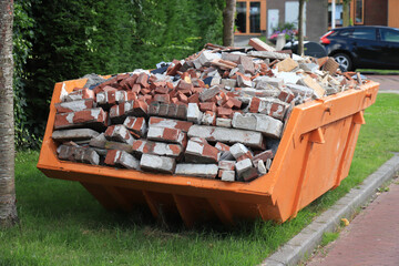 Bricks in a Garbage Dumpster
