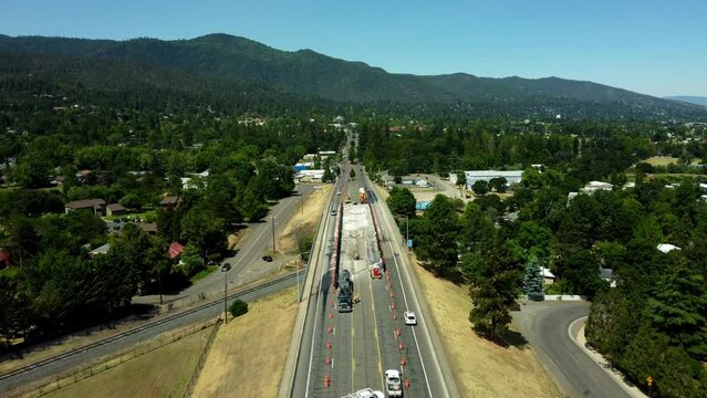 Ashland, Oregon, USA.  Summer 2023.   Flying over road costruction being done to repair a railroad overpass on Ashland St.