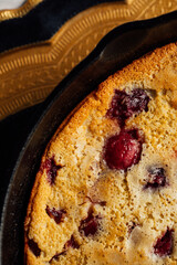 cherry clafoutis in cast iron skillet