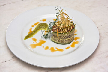 tuna carpaccio with cucumber slice, dressing and fried corn, raw tuna pie, gourmet food
