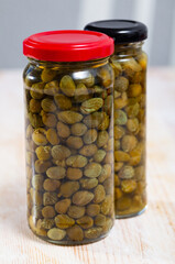Glass jar with pickled capers