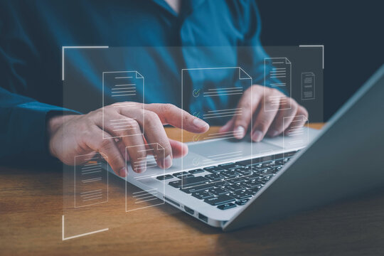 Document management system (DMS) technology, businessman use laptop with database folder online to store files document data digital. file storage process with security. document system concept.