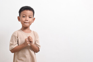 Image of Asian child posing cute and isolated on white background. portrait of an Asian boy