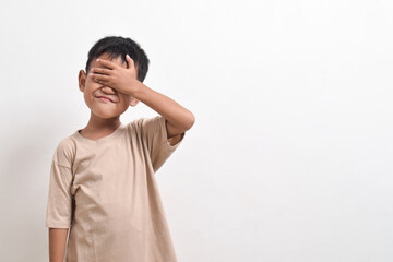 Image of Asian child crying on white background. portrait of an Asian boy