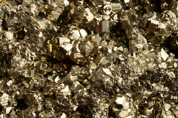 Close-up of Peruvian Pyrite crystals: a  Metallic Golden background