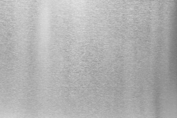 Shiny silver foil as background, top view