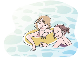 プールで遊ぶ若い女性たち