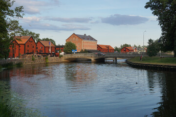 Buildings by the canal during evening