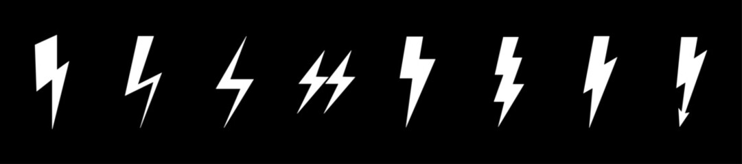 Flash thunderbolt lighting symbol set of eight icons in white color on black background. Different flash icon symbol collection. Electric power symbol. Energy sign, vector illustration. charge sign.