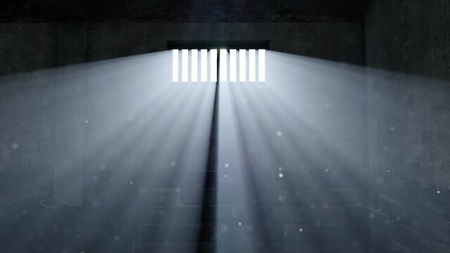 Sunlight shines through the cold and dark prison window