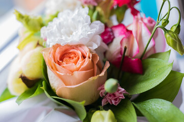 Bouquet with different flowers. Festive bouquet close-up.