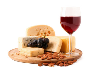 Plate with tasty cheese, grapes, nuts and glass of wine on white background
