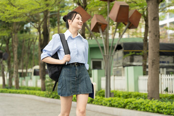 Portrait of female college student in the park