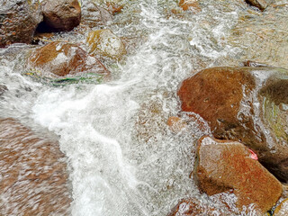 water flowing over rocks