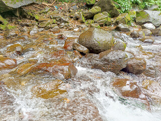 water flowing over rocks
