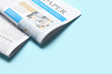 Different newspapers on blue background