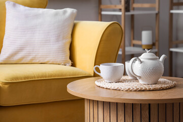 tea set on table in living room, closeup